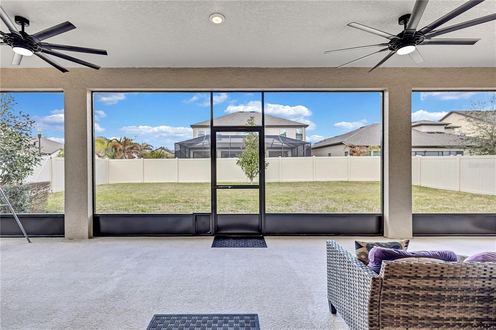 4593 Shoreleaf Loop Valrico, FL 33596 - Photo 35 of 39 a view of a bedroom with a large window