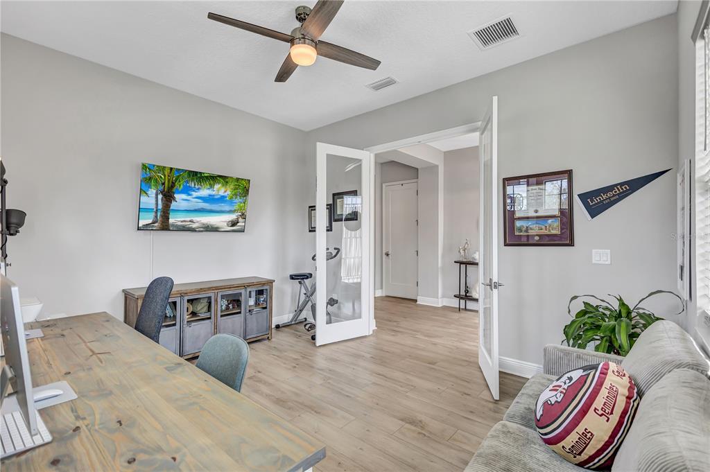 4593 Shoreleaf Loop Valrico, FL 33596 - Photo 5 of 39 a living room with furniture