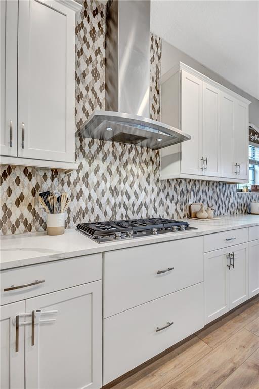 4593 Shoreleaf Loop Valrico, FL 33596 - Photo 9 of 39 a view of a sink and dishwasher with white cabinets