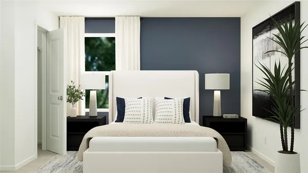 a bedroom with a bed and a table