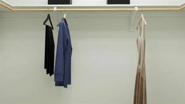a view of walk in closet with clothes