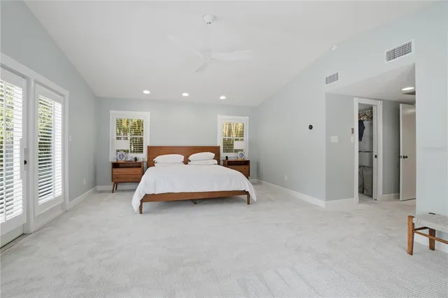 a kitchen with stainless steel appliances granite countertop a stove and a refrigerator