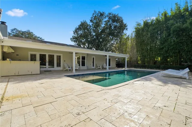 an aerial view of a houses with outdoor space and street view