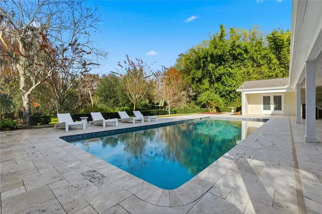 a view of a garden with a lake view