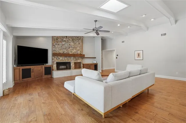 a kitchen with stainless steel appliances granite countertop a stove and a sink