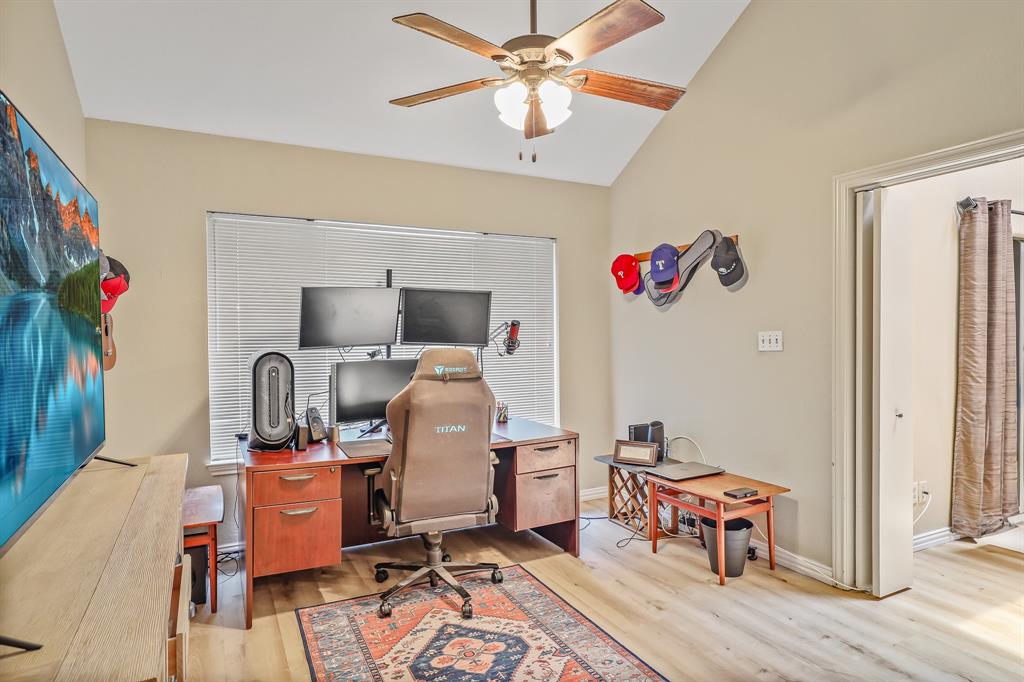 1118 Signal Ridge Place Rockwall, TX 75032 - Photo 17 of 33 a living room with furniture and a rug
