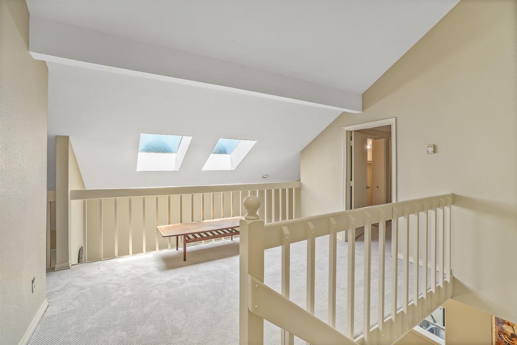 1118 Signal Ridge Place Rockwall, TX 75032 - Photo 24 of 33 a view of a hallway with stairs