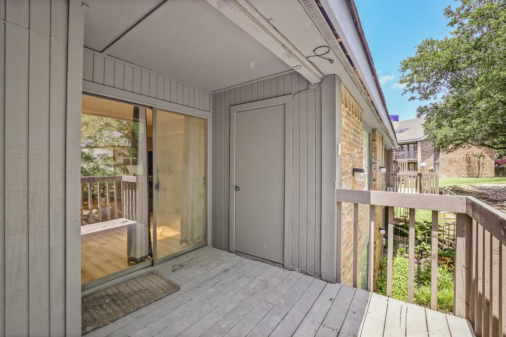 1118 Signal Ridge Place Rockwall, TX 75032 - Photo 30 of 33 a view of a balcony with wooden floor