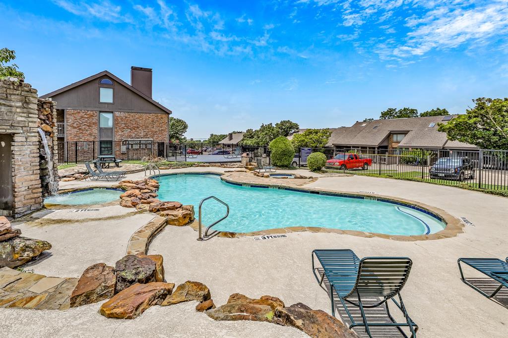 1118 Signal Ridge Place Rockwall, TX 75032 - Photo 31 of 33 a view of a swimming pool with lounge chairs