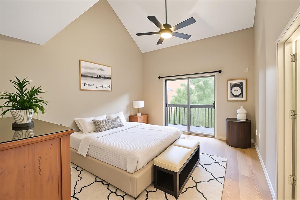 1118 Signal Ridge Place Rockwall, TX 75032 - Photo 10 of 33 a bedroom with a bed and a table