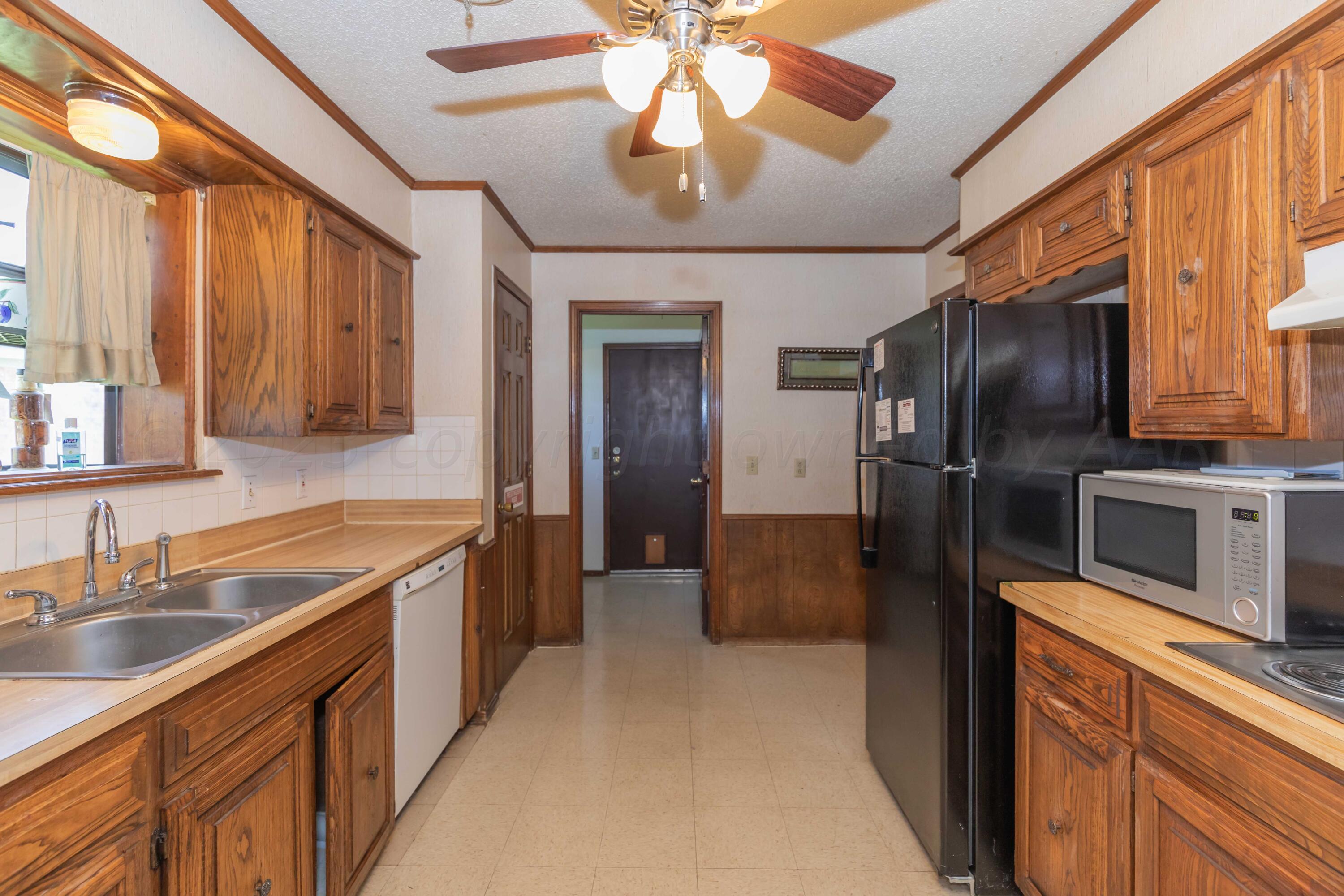 6013 Devon Drive Amarillo, TX 79109 - Photo 7 of 30 KITCHEN VIEW 2