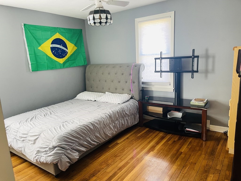 17 Queensview Road Marlborough, MA 01752 - Photo 13 of 41 a bedroom with a bed and a table in it