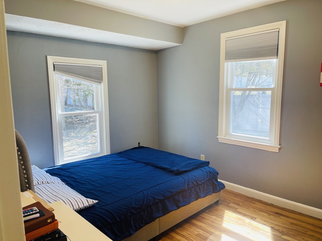 17 Queensview Road Marlborough, MA 01752 - Photo 16 of 41 a bed sitting in a bedroom next to a window