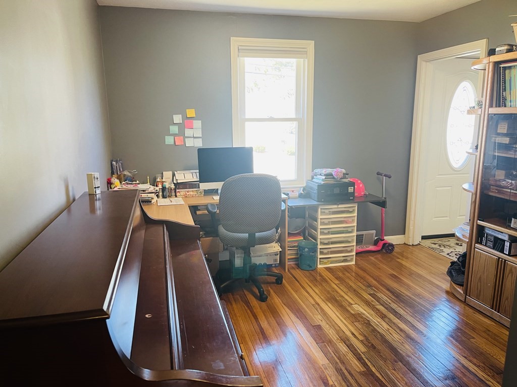 17 Queensview Road Marlborough, MA 01752 - Photo 17 of 41 a room with wooden floor and furniture