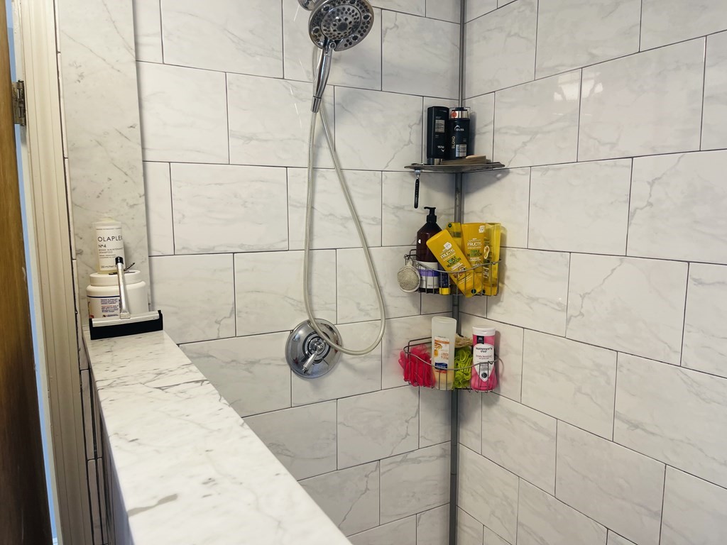 17 Queensview Road Marlborough, MA 01752 - Photo 27 of 41 a bathroom with a sink and a shower