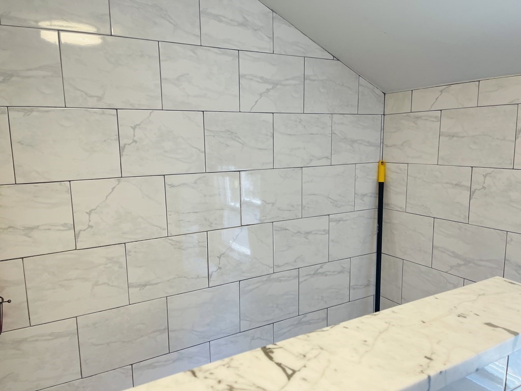 17 Queensview Road Marlborough, MA 01752 - Photo 28 of 41 a bathroom with a bathtub