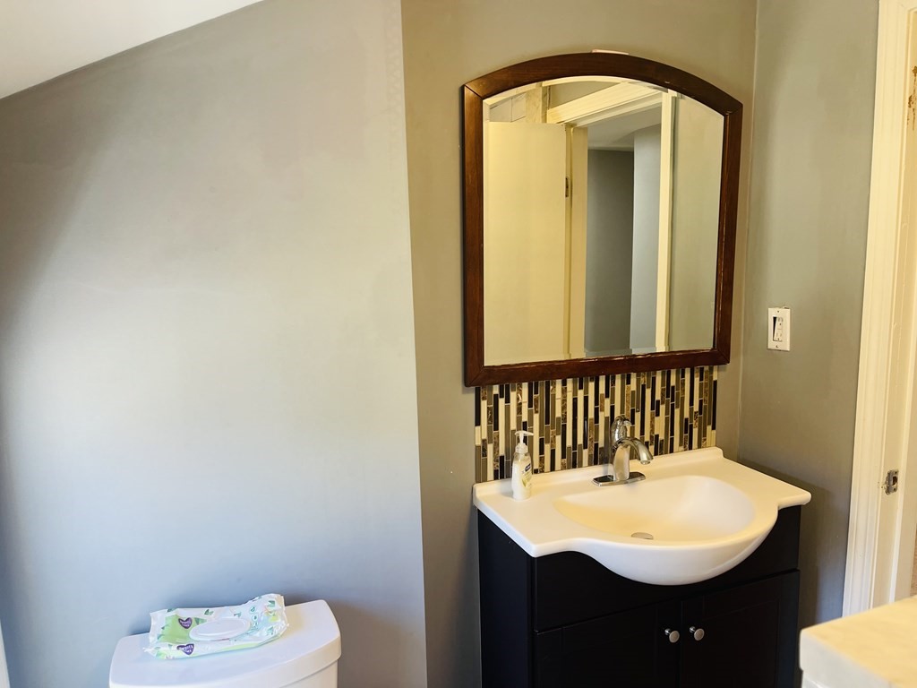 17 Queensview Road Marlborough, MA 01752 - Photo 29 of 41 a bathroom with a sink and a mirror
