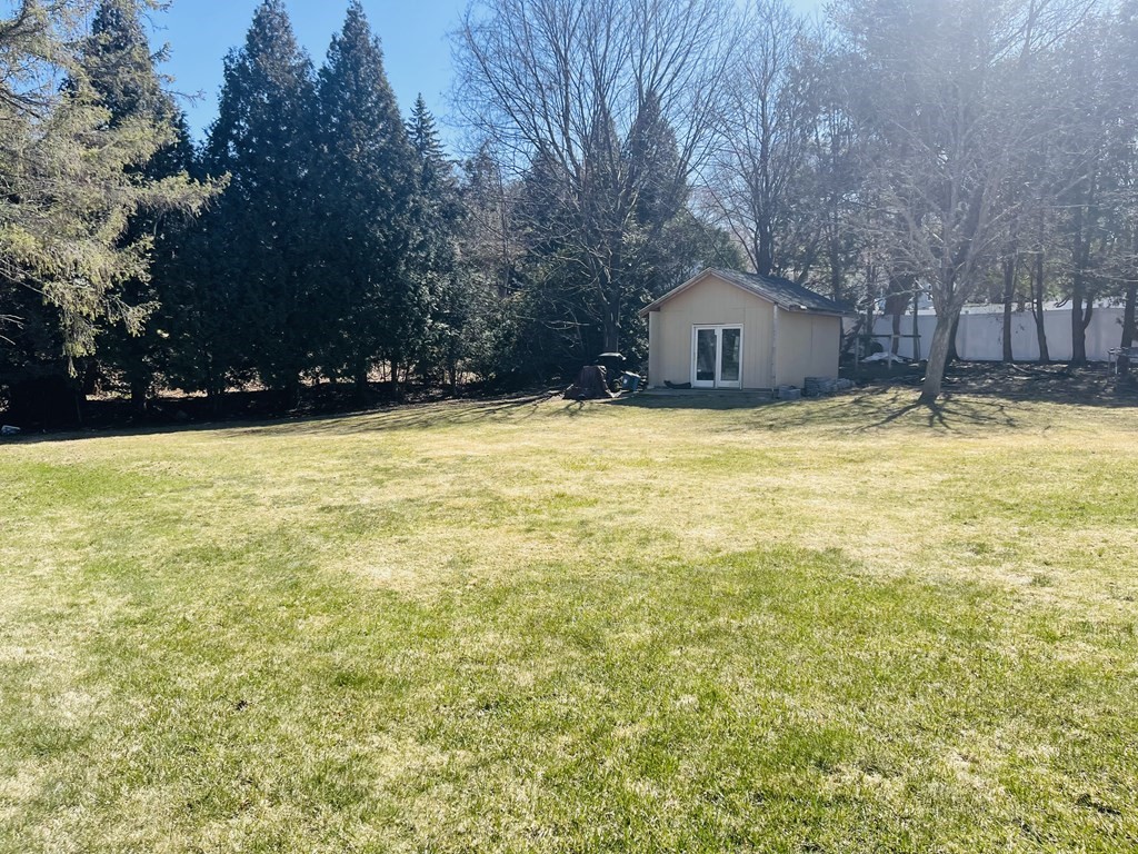 17 Queensview Road Marlborough, MA 01752 - Photo 41 of 41 a house with a yard and a large tree
