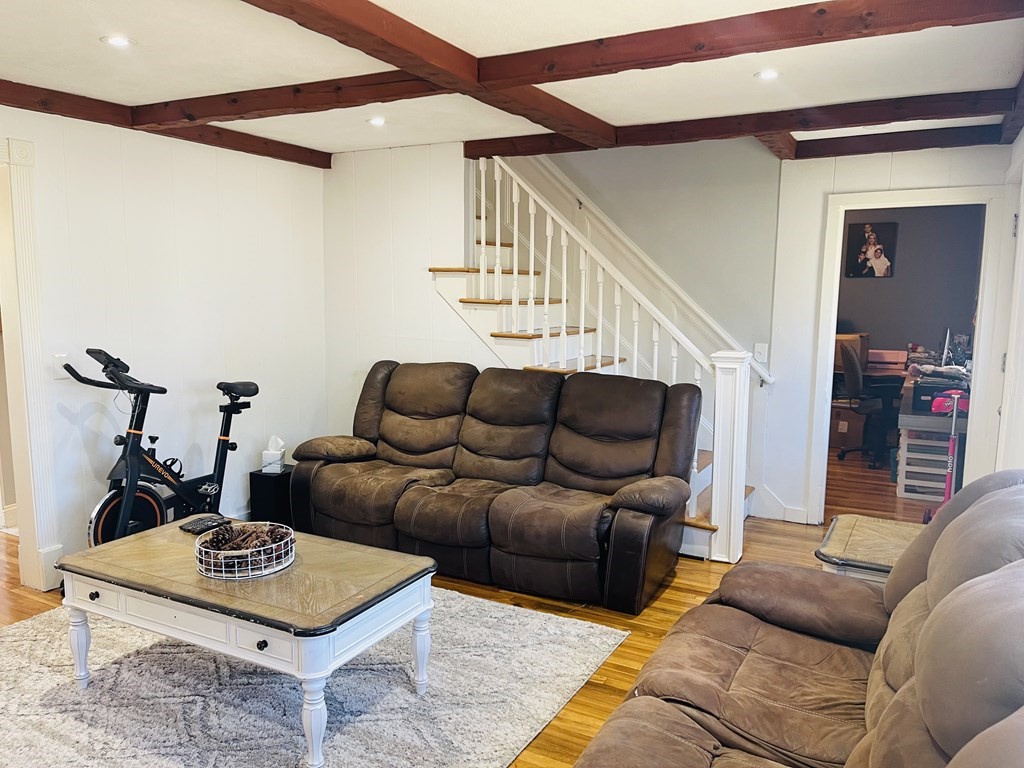 17 Queensview Road Marlborough, MA 01752 - Photo 5 of 41 a living room with furniture and a wooden floor