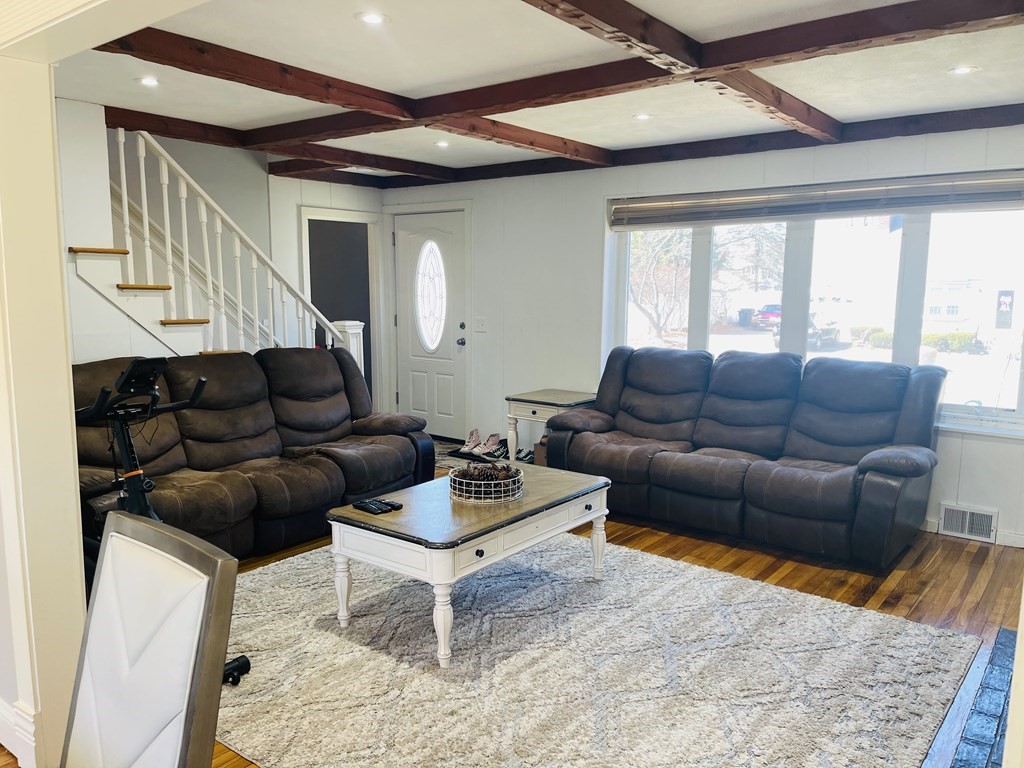 17 Queensview Road Marlborough, MA 01752 - Photo 6 of 41 a living room with furniture a rug and a window