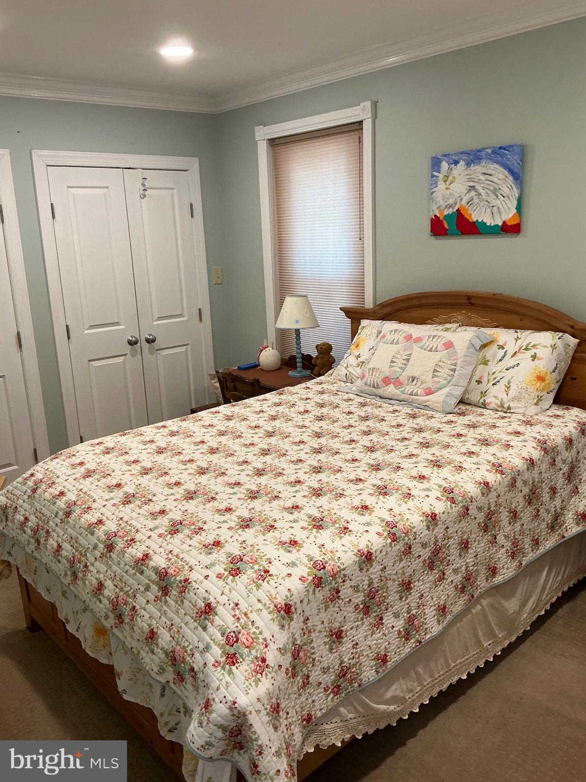 29 Centre Street Haddonfield, NJ 08033 - Photo 28 of 39 a bedroom with a bed and a painting on the wall