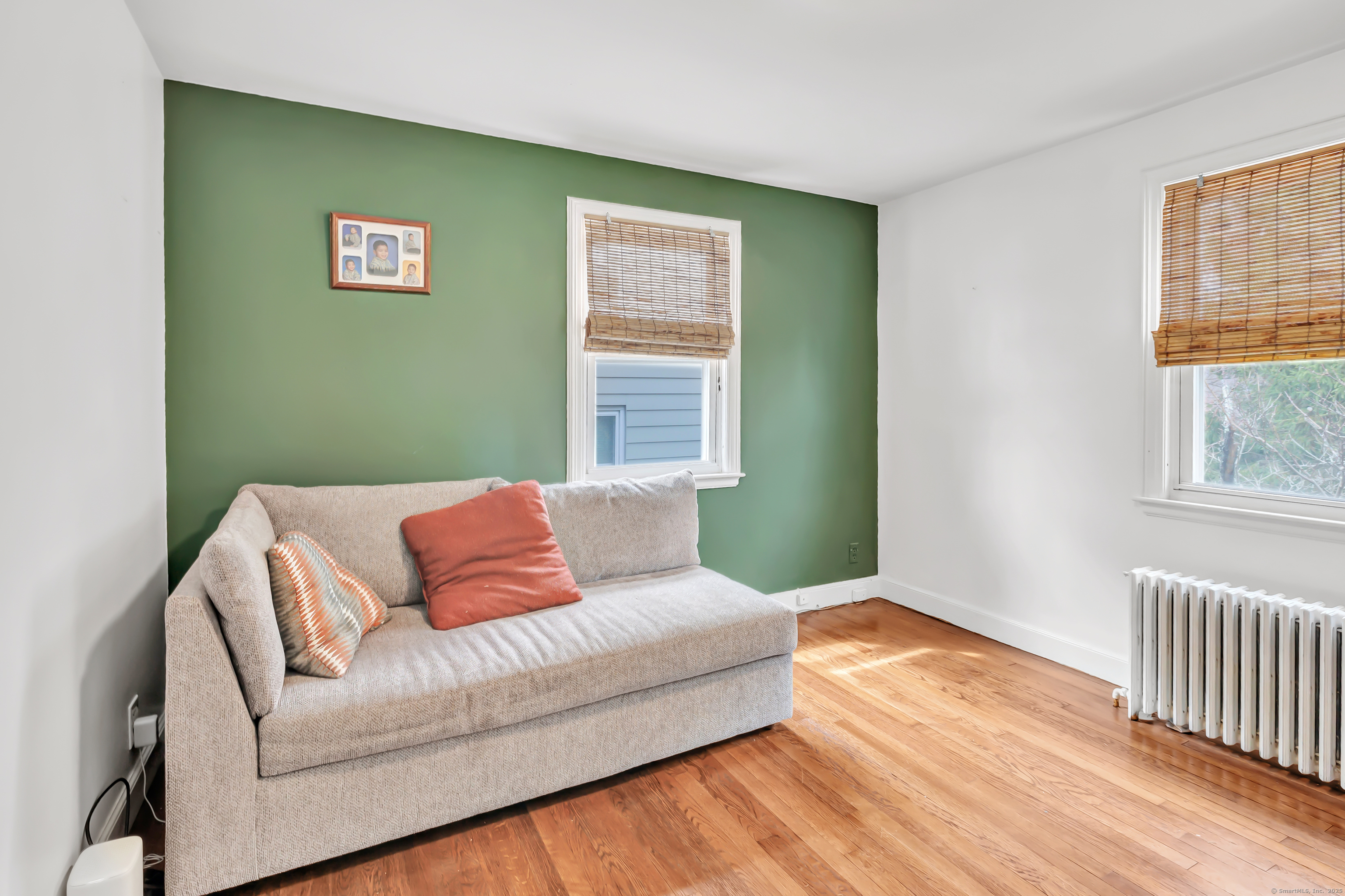 804 Washington Ave Extension Waterbury, CT 06708 - Photo 16 of 35 a bedroom with a bed and a couch