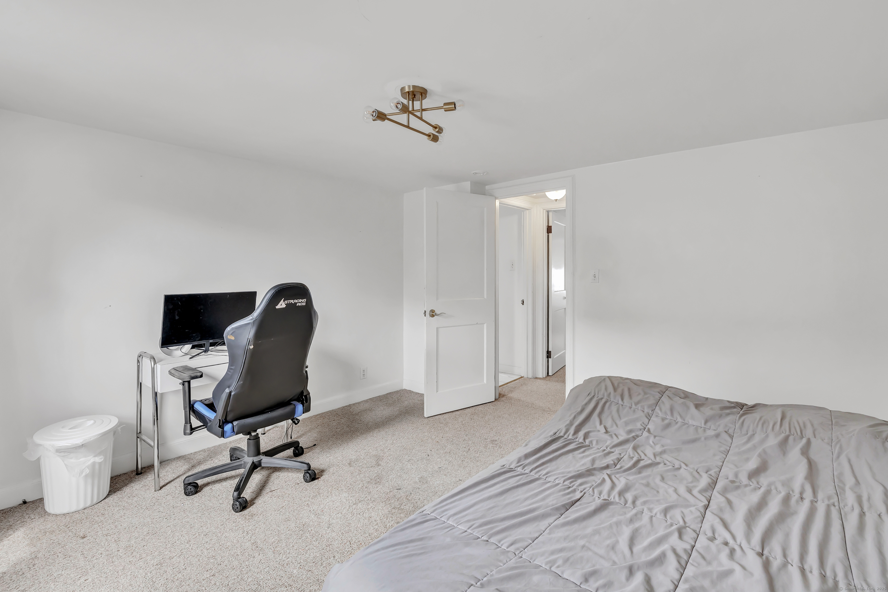 804 Washington Ave Extension Waterbury, CT 06708 - Photo 26 of 35 a view of a workspace with furniture