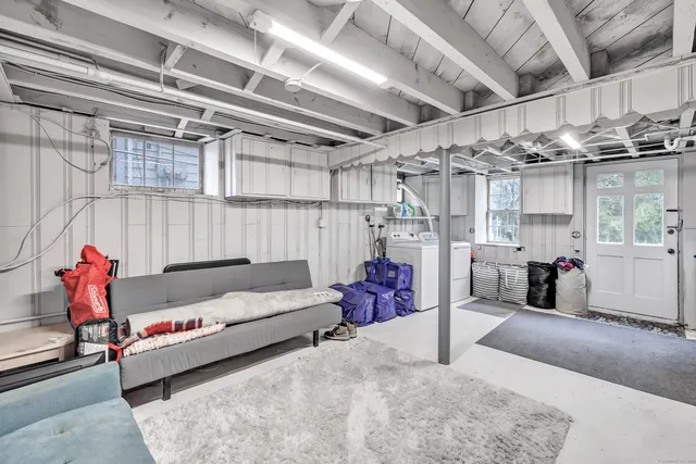 a living room with lots of furniture and a couch