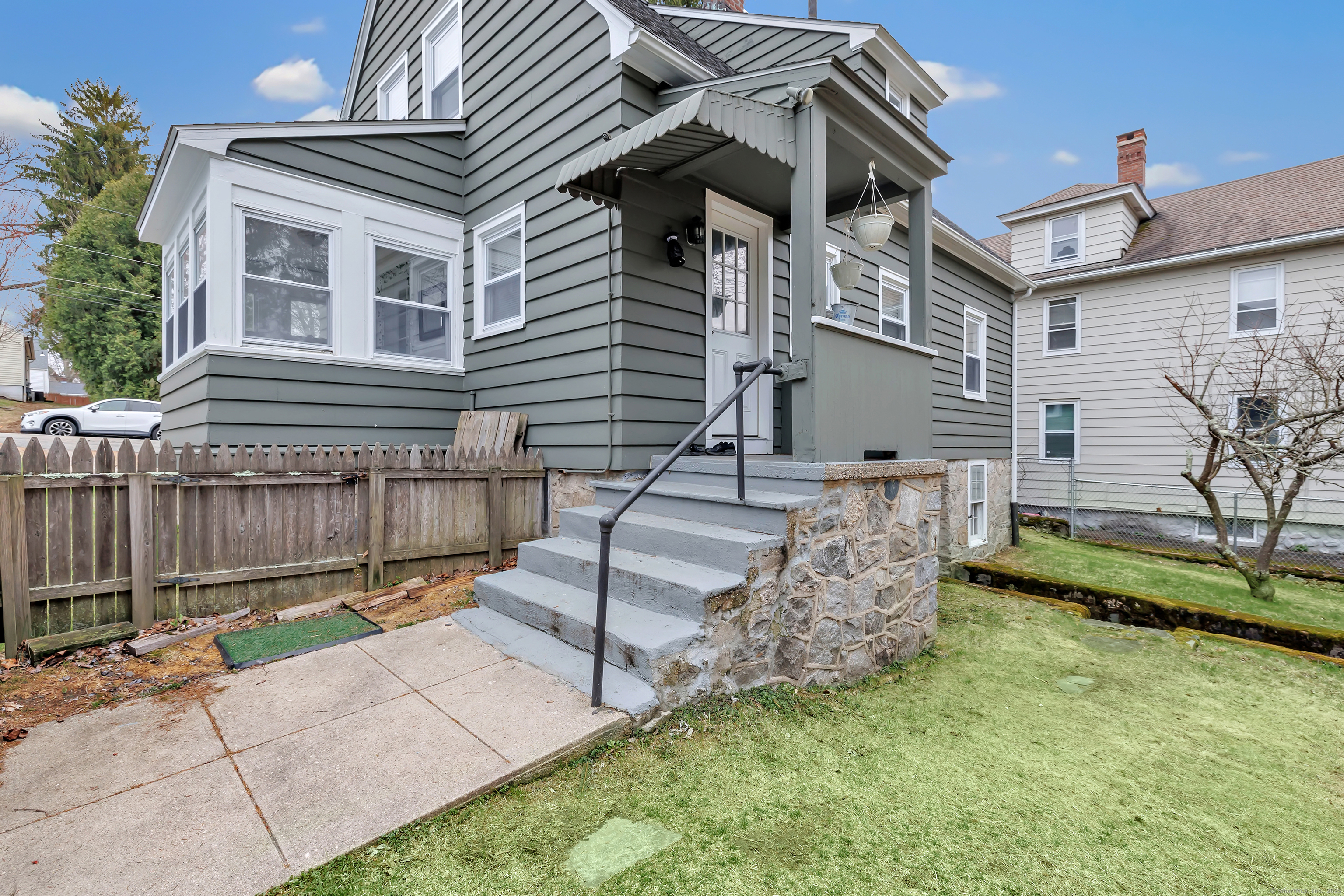 804 Washington Ave Extension Waterbury, CT 06708 - Photo 29 of 35 front view of a house with a yard