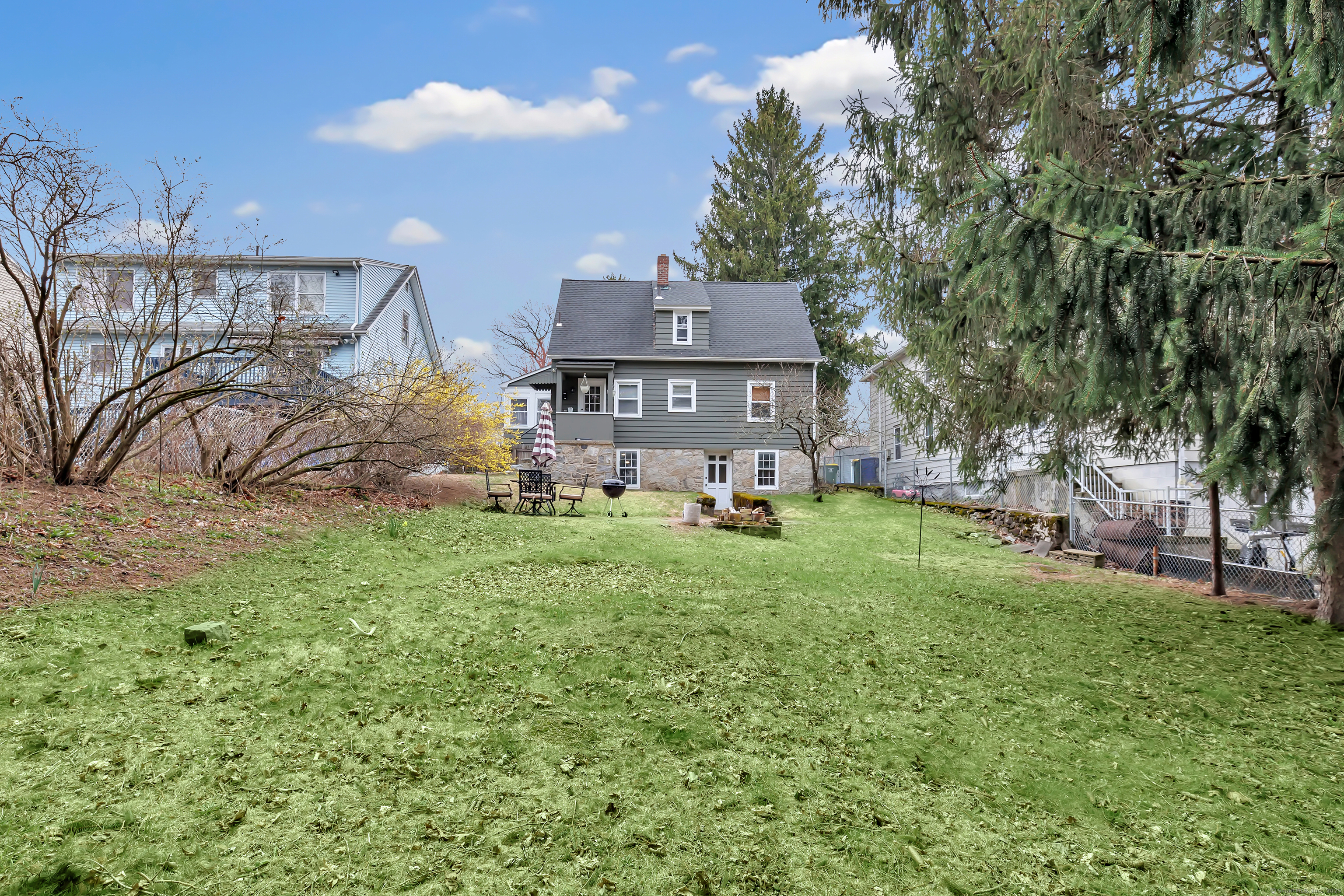 804 Washington Ave Extension Waterbury, CT 06708 - Photo 32 of 35 a front view of a house with garden