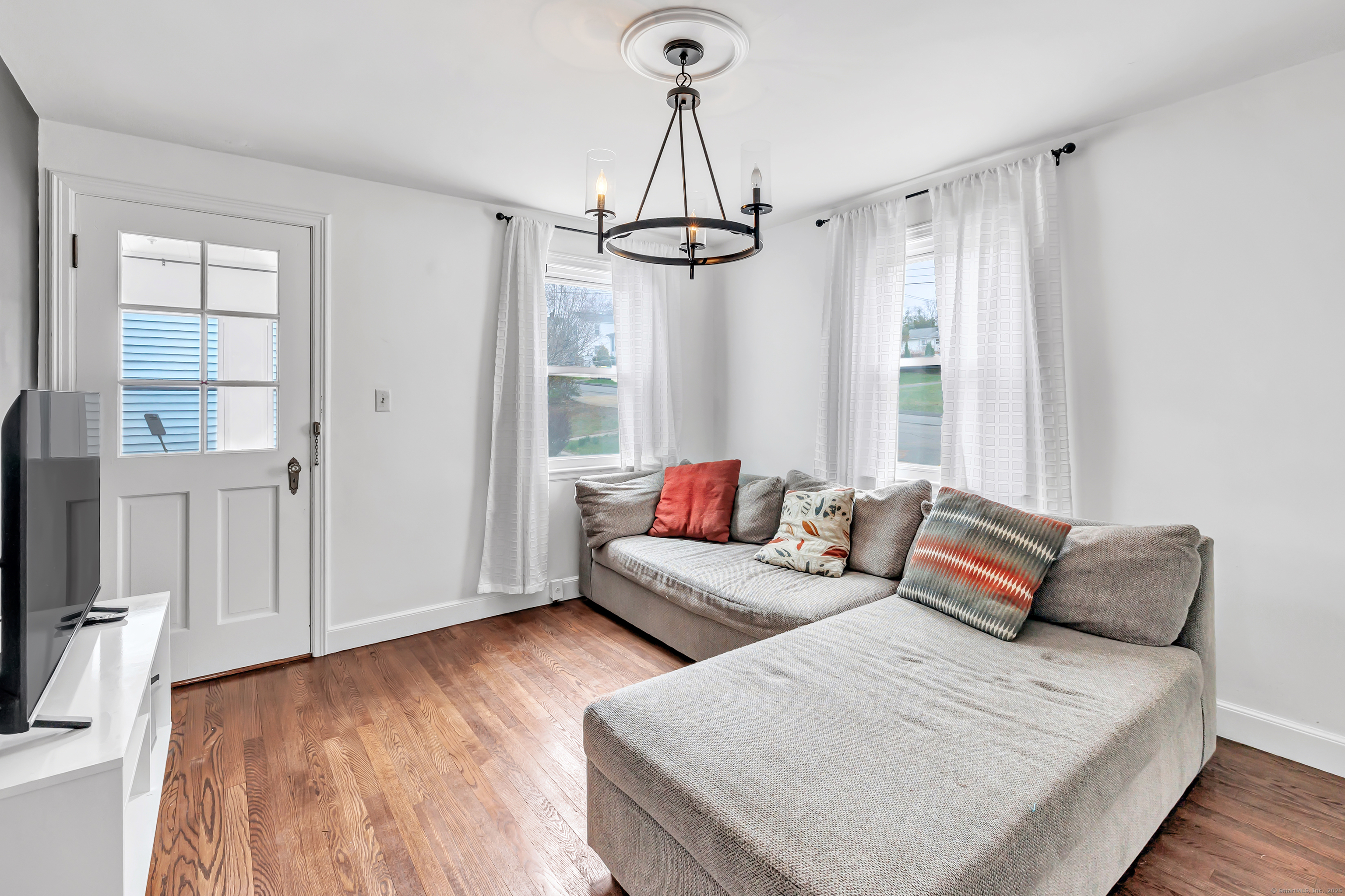 804 Washington Ave Extension Waterbury, CT 06708 - Photo 7 of 35 a bedroom with furniture and a window