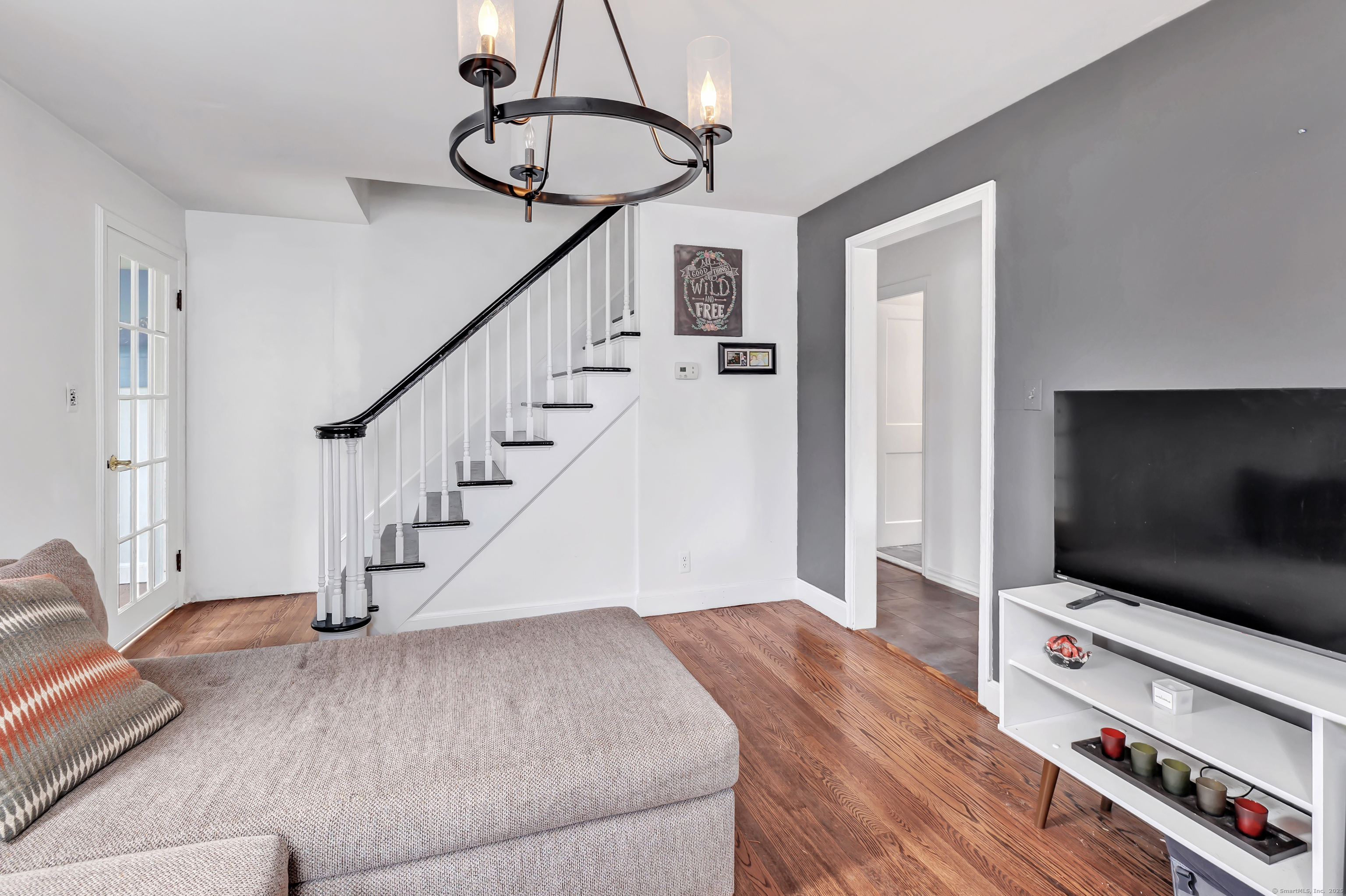 804 Washington Ave Extension Waterbury, CT 06708 - Photo 8 of 35 a living room with furniture and a flat screen tv