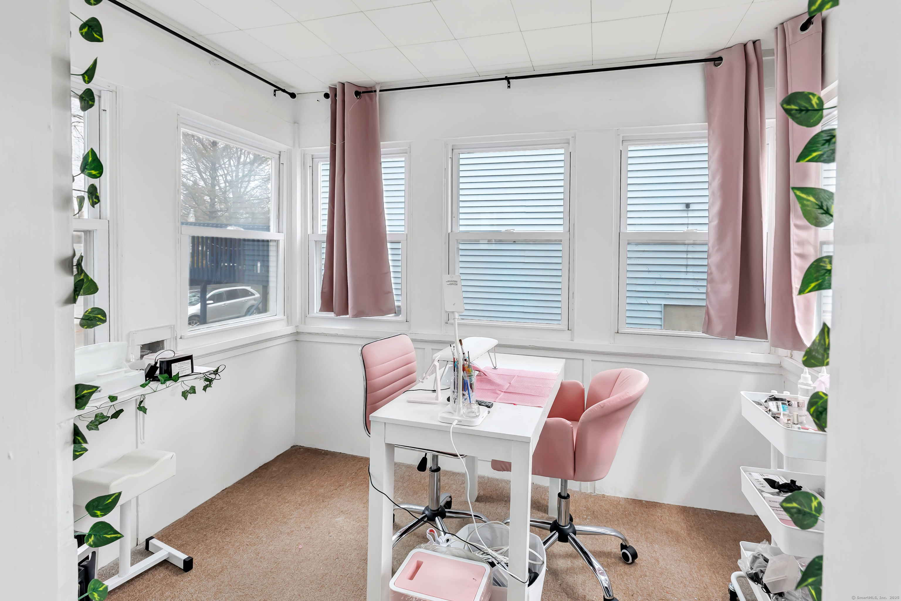 804 Washington Ave Extension Waterbury, CT 06708 - Photo 9 of 35 a view of a dining room with furniture window and wooden floor