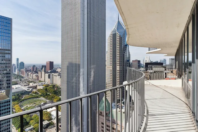 a view of a balcony with city view