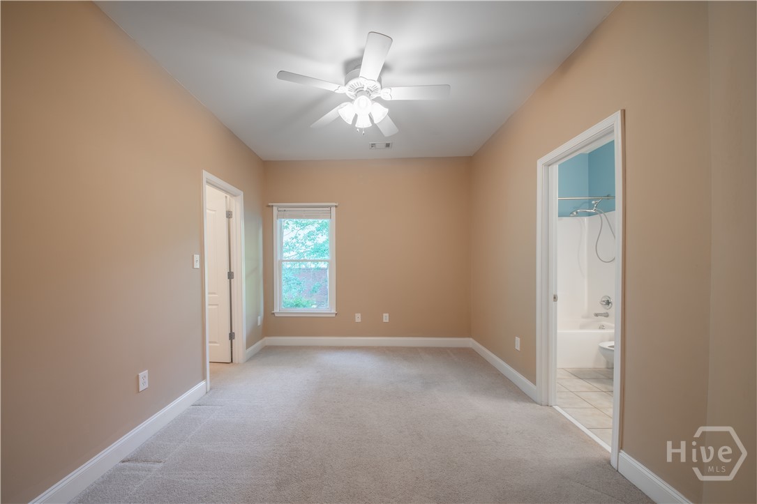 217 Hidden Spring Way Athens, GA 30605 - Photo 29 of 55 Secondary Suite - Bedroom 4 and Bathroom off the Kitchen and next to Stairs