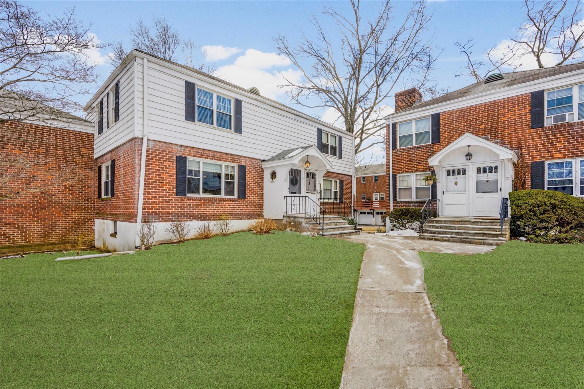 View of unit on the left and common courtyard