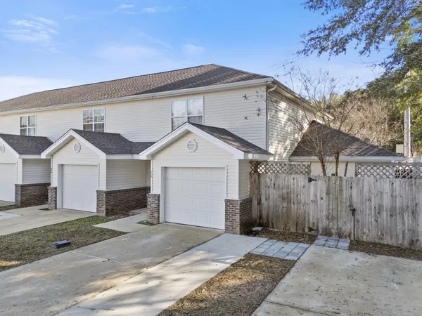 a view of a front of house with a garage