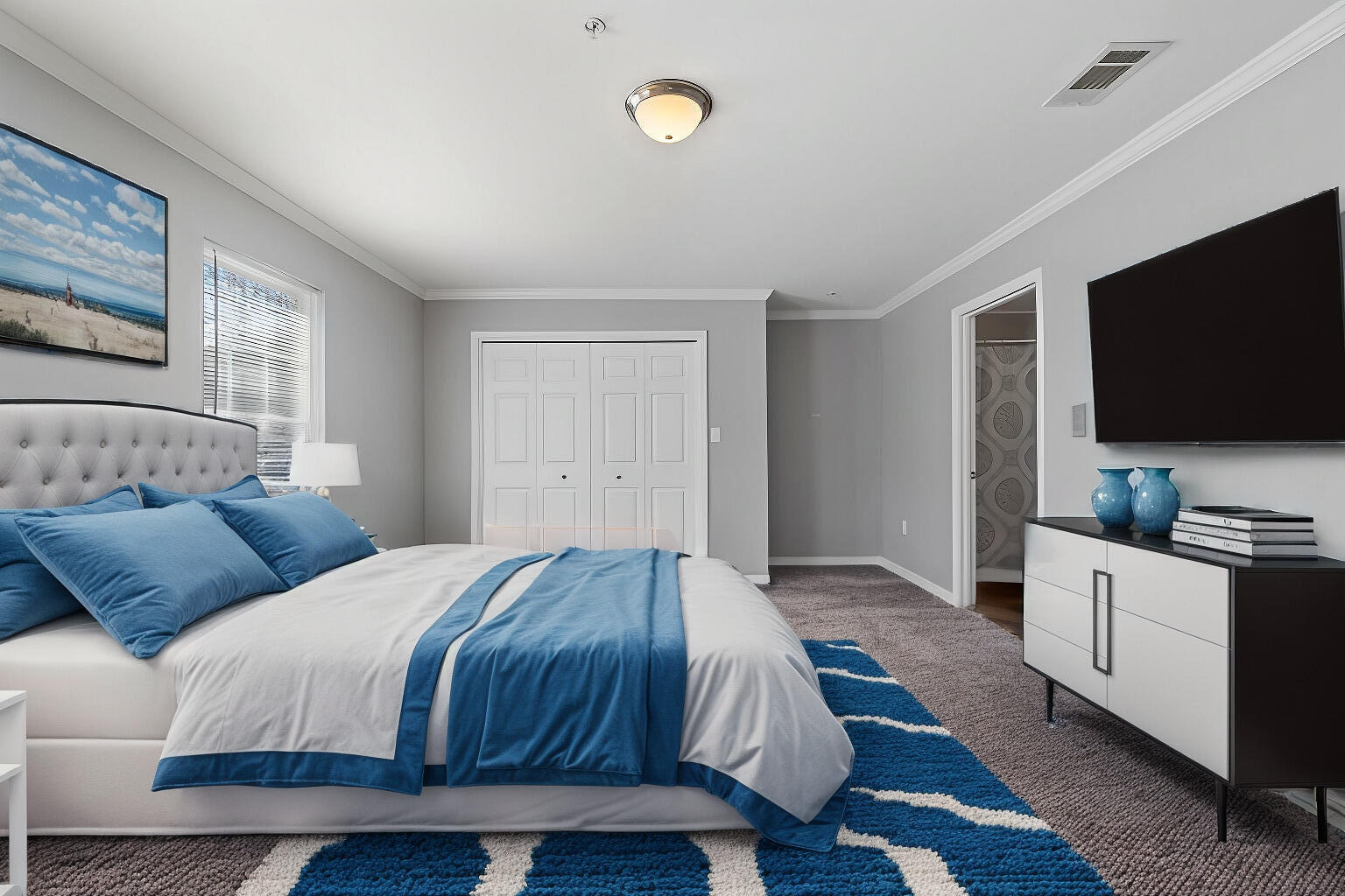 108 Corwin Drive Crestview, FL 32539 - Photo 11 of 20 a bedroom with a bed and a flat screen tv