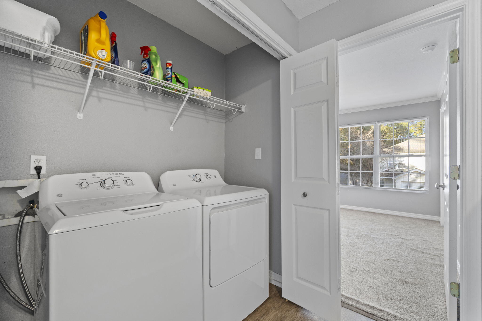 108 Corwin Drive Crestview, FL 32539 - Photo 16 of 20 a utility room with dryer and washer