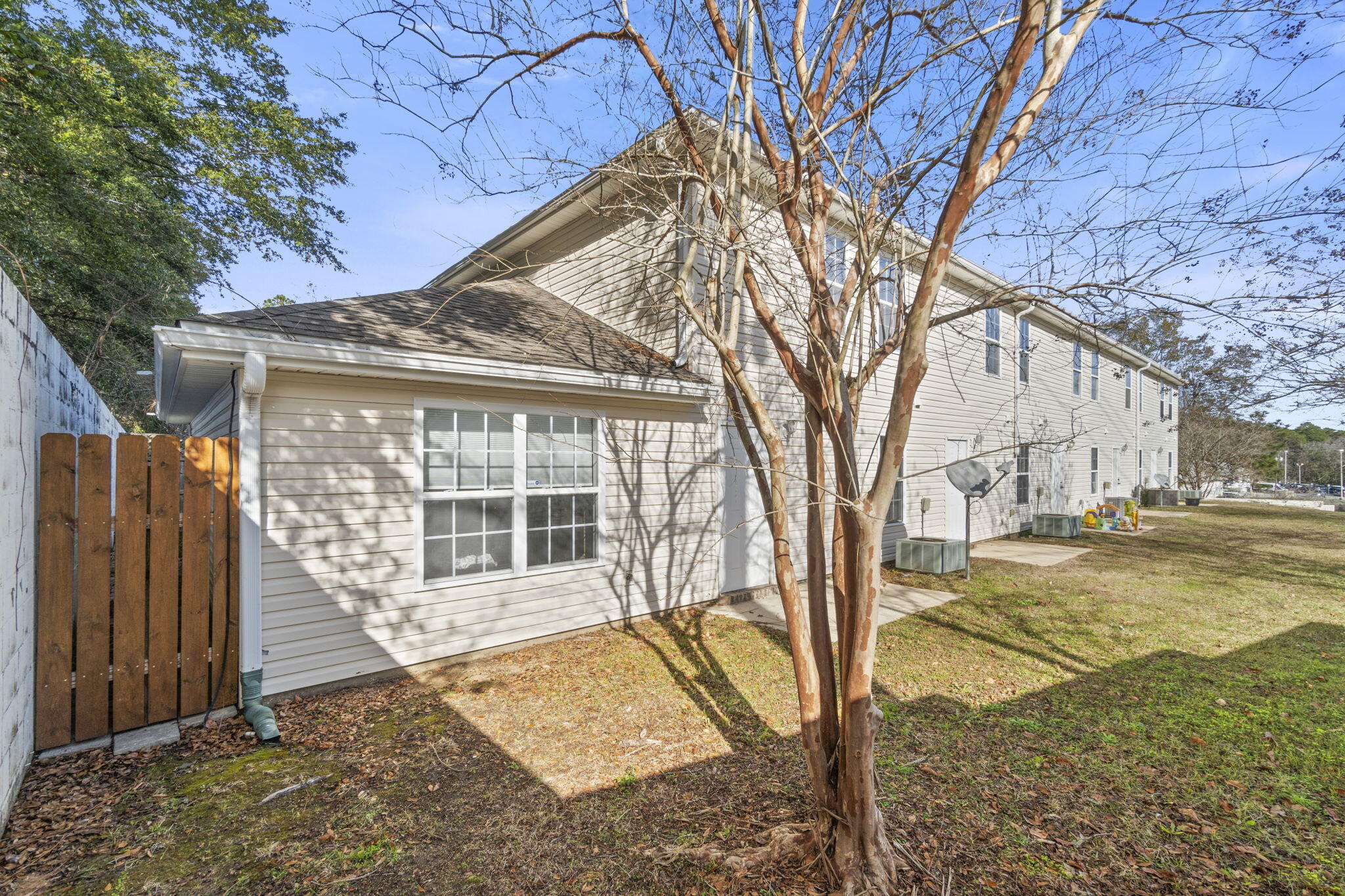 108 Corwin Drive Crestview, FL 32539 - Photo 18 of 20 a view of a house with a yard