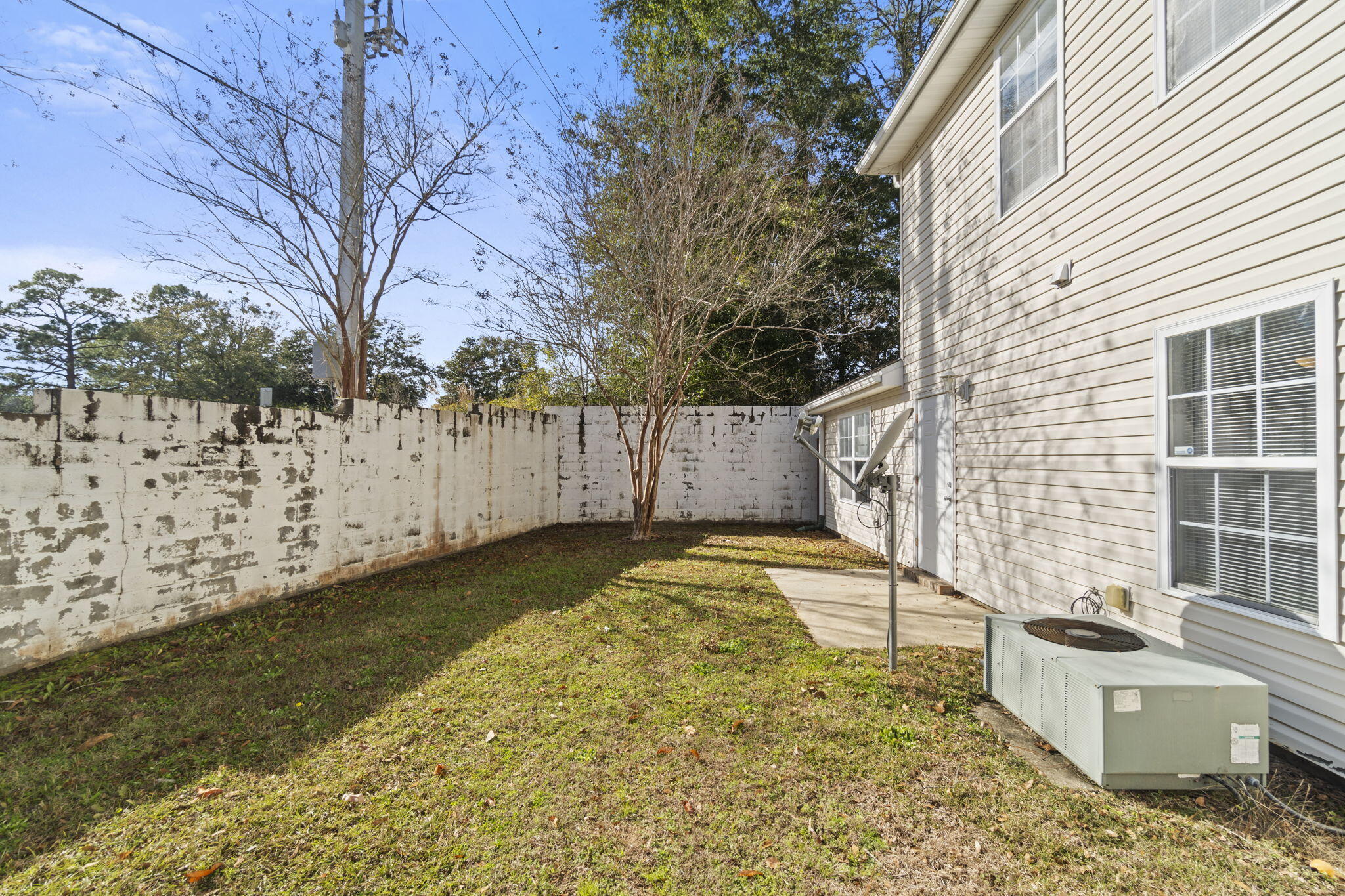 108 Corwin Drive Crestview, FL 32539 - Photo 19 of 20 a view of a backyard with a tree