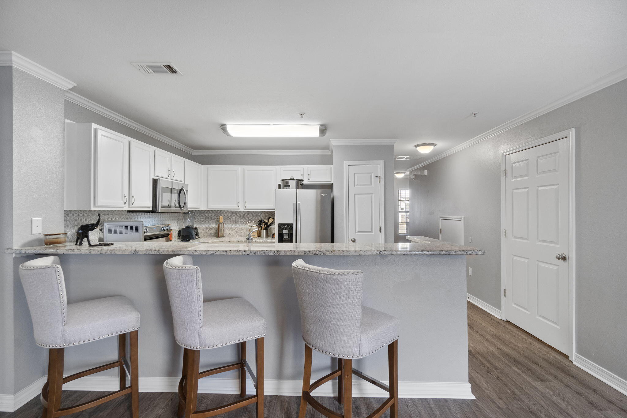 108 Corwin Drive Crestview, FL 32539 - Photo 4 of 20 a kitchen with appliances a sink and cabinets