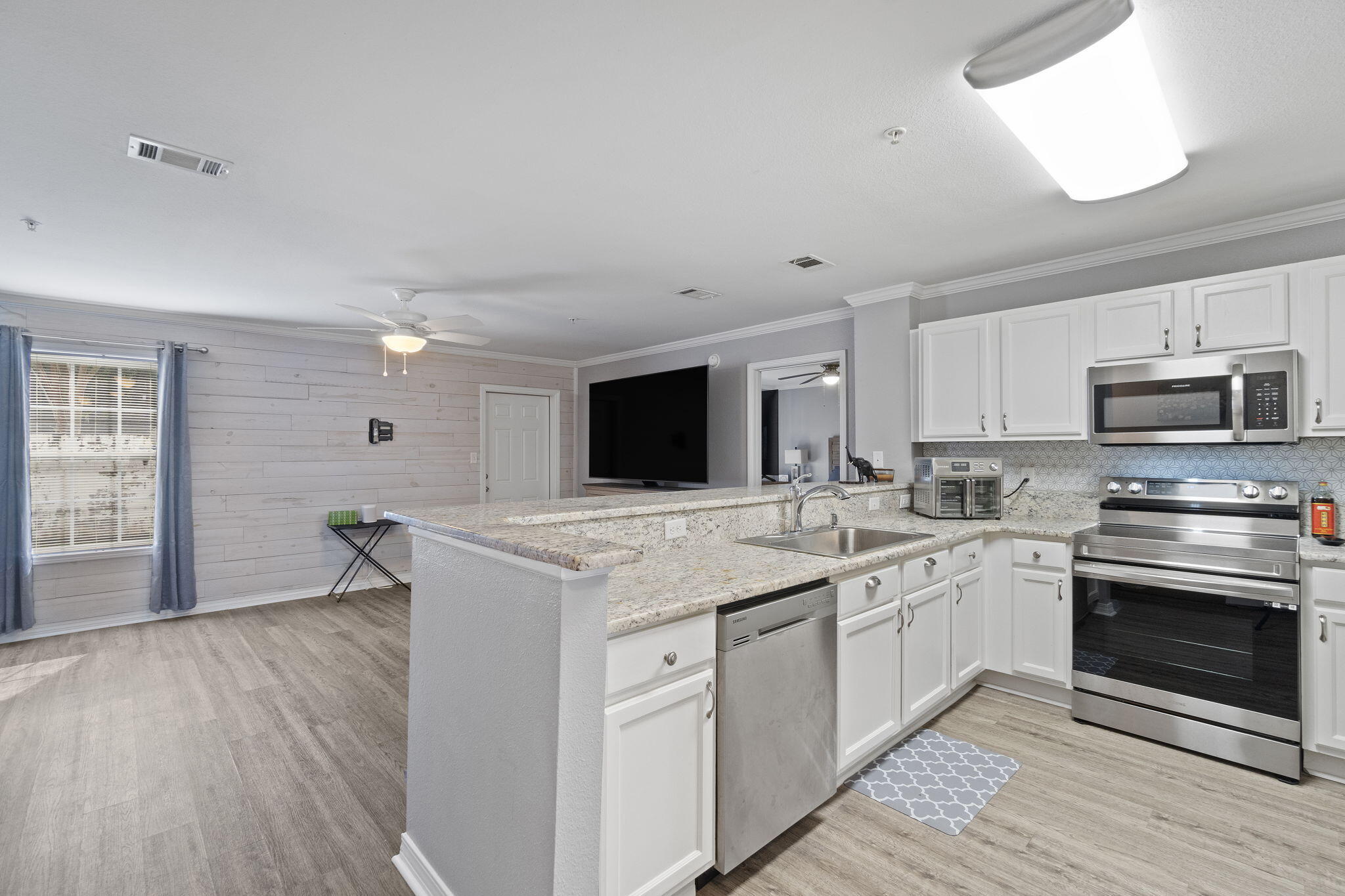 108 Corwin Drive Crestview, FL 32539 - Photo 6 of 20 a kitchen with a sink and cabinets