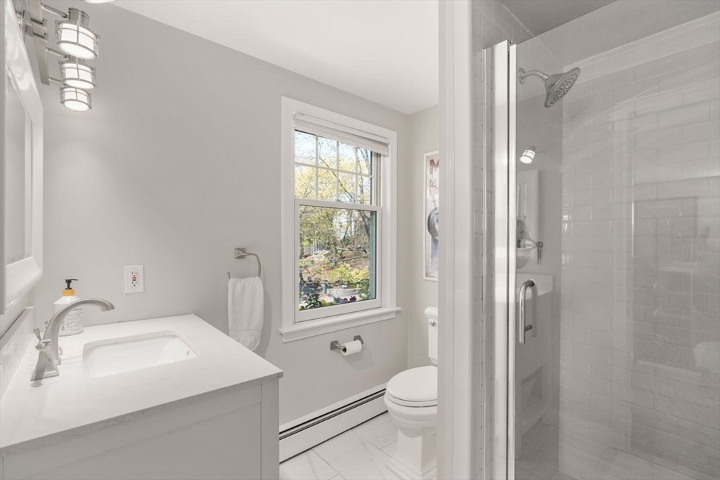 69 Royalston Road Wellesley, MA 02481 - Photo 24 of 31 a bathroom with a sink toilet and shower