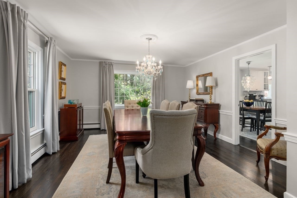 69 Royalston Road Wellesley, MA 02481 - Photo 9 of 31 a dining room with furniture a chandelier and window