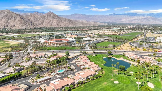 an aerial view of a house with a garden