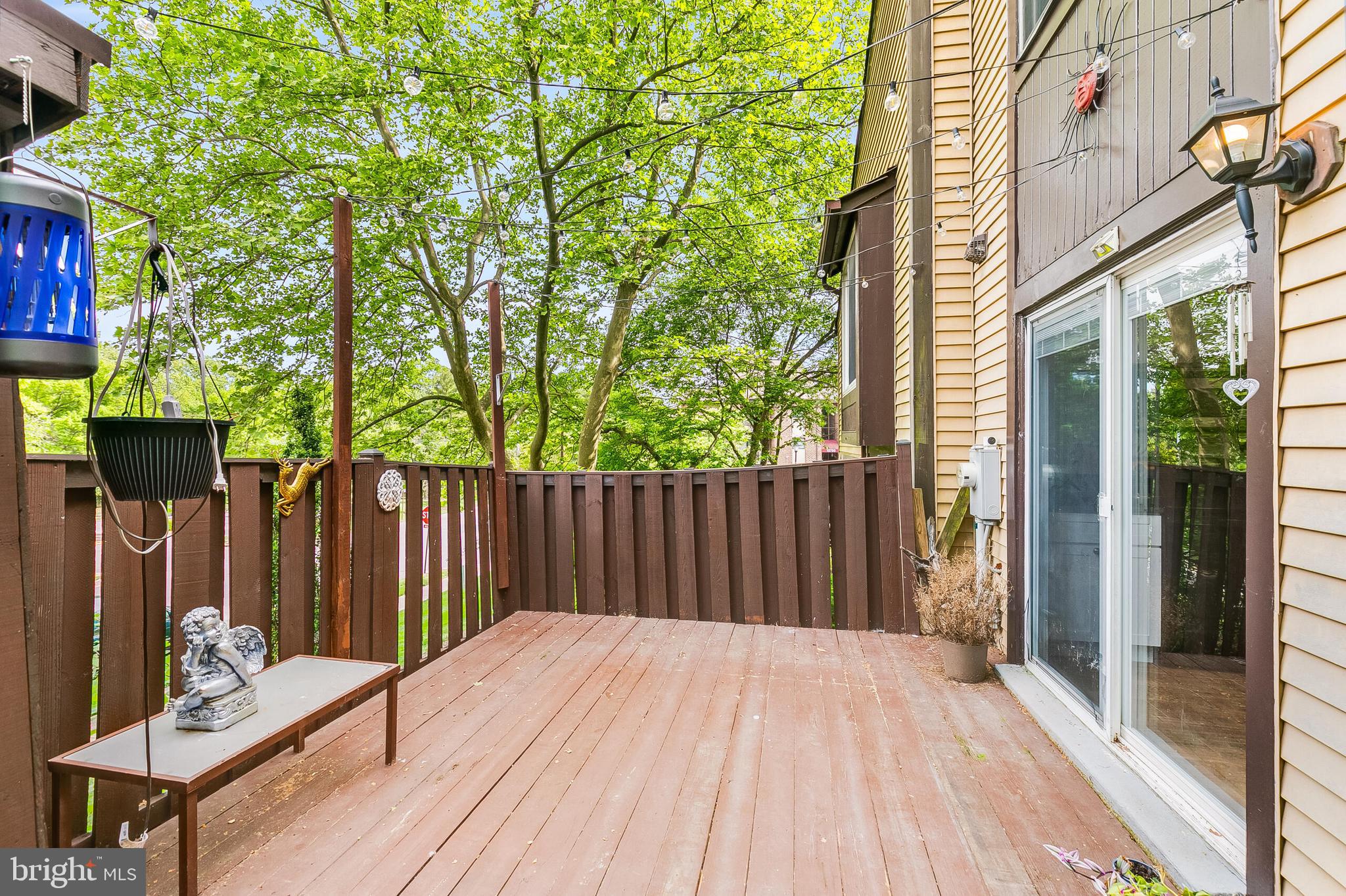 7329 Split Rail Lane Laurel, MD 20707 - Photo 14 of 32 a view of backyard with deck and wooden fence