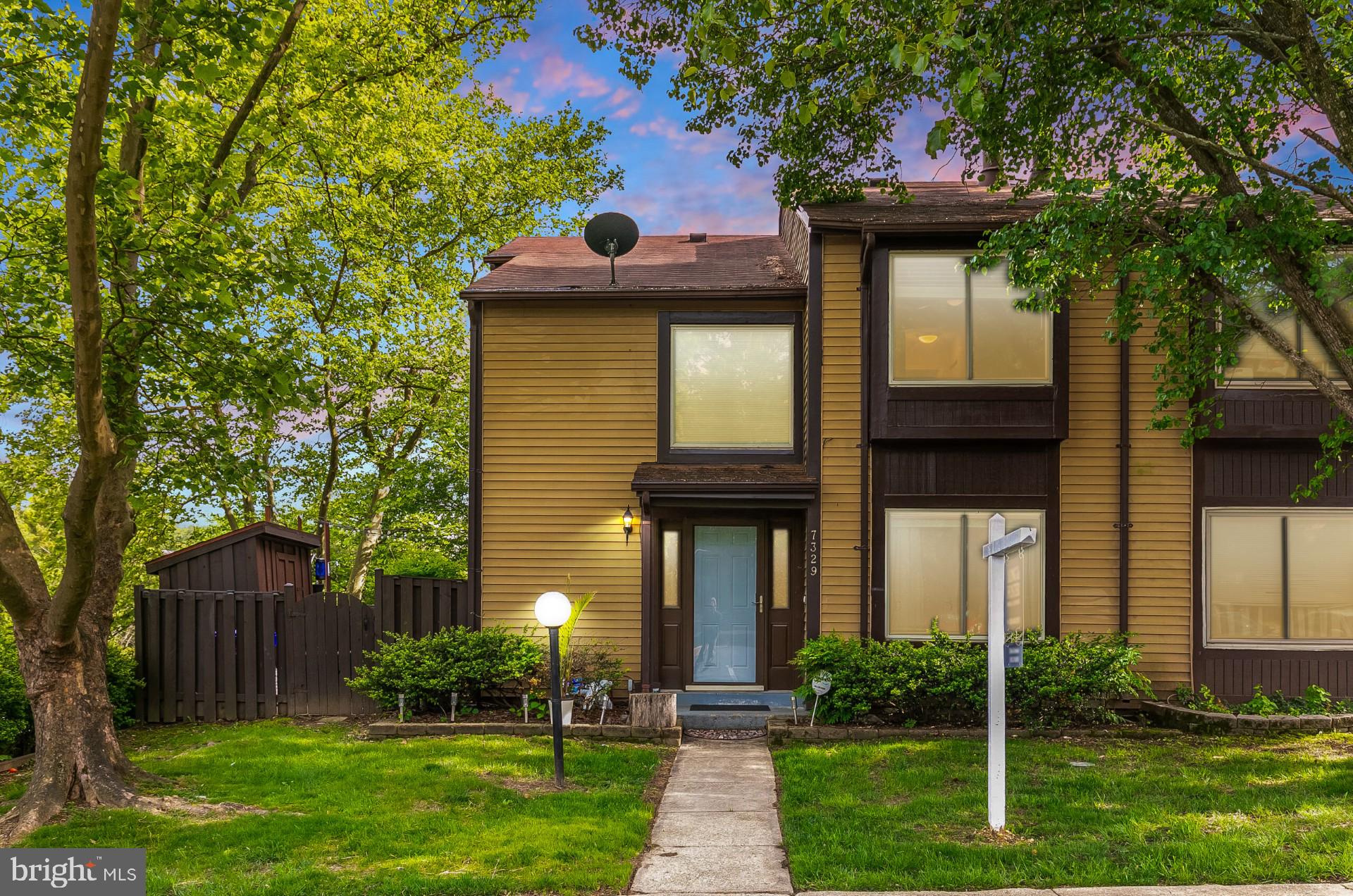 7329 Split Rail Lane Laurel, MD 20707 - Photo 30 of 32 a front view of a house with garden