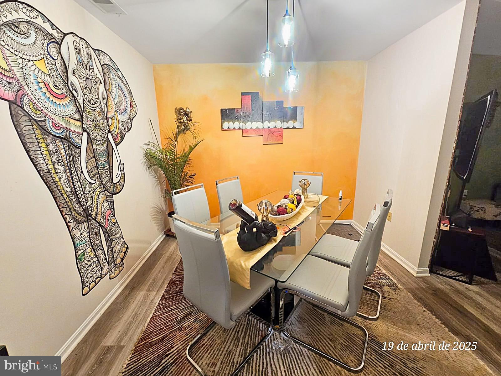 7329 Split Rail Lane Laurel, MD 20707 - Photo 6 of 32 a view of a dining room with furniture and wooden floor