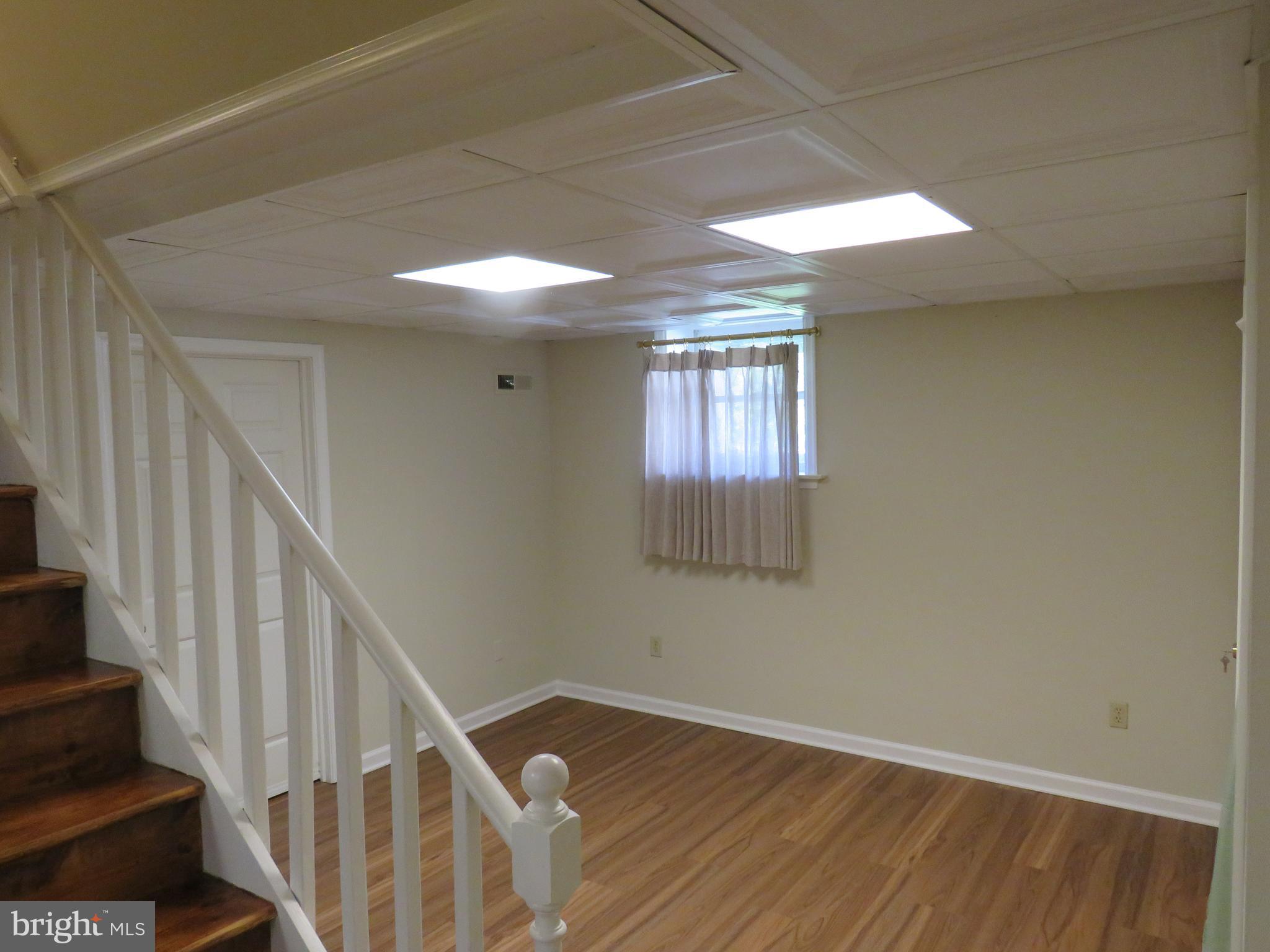 10 Spring Hill Road Perkasie, PA 18944 - Photo 30 of 74 Finished Basement with two sections for storage